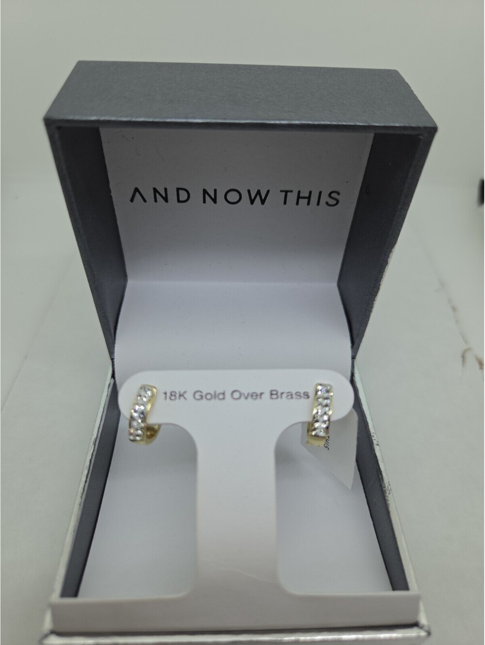 And Now This Crystal Huggie Hoop Earrings 18K Gold Over Brass $50 Retail Box
